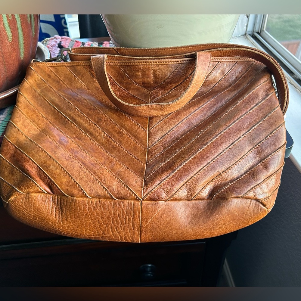 Beautiful brown lattice leather bag